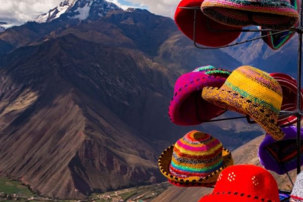 assorted-color hats on rack wallpaper